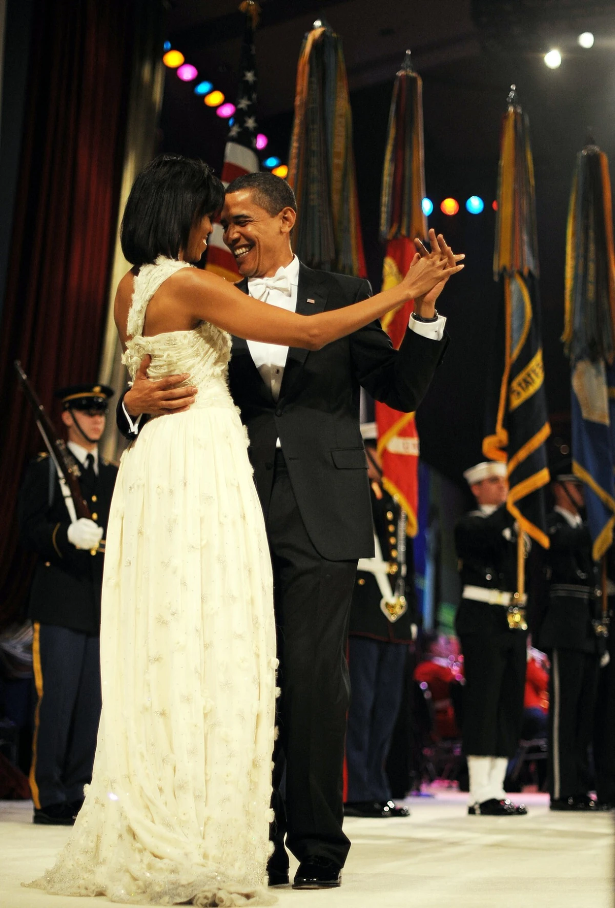 US President Barack Obama (R) and First Lady Michelle Obama (L) dance during their visit to the Biden Home States Inaugural Ball on January 20, 2009 at the Washington Convention Center in Washington, DC.,Image: 29124306, License: Rights-managed, Restrictions:, Model Release: no, Credit line: Tim SLOAN/AFP/Profimedia