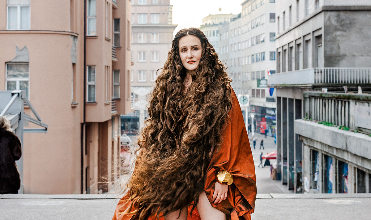 Žena